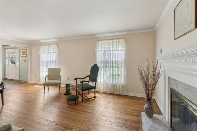 Gracious room with hardwood floors | Image 6