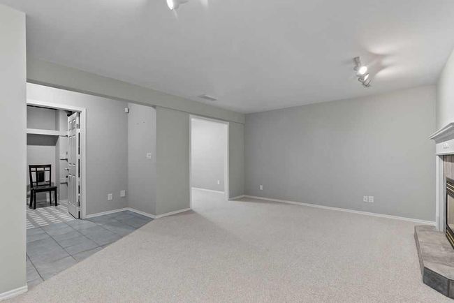 76 Coach Gate Way Sw, House other with 3 bedrooms, 2 bathrooms and 4 parking in Calgary AB | Image 31