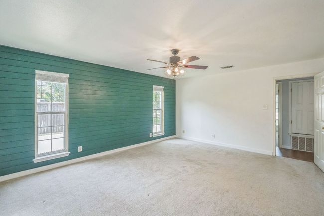 Primary bedroom with ship lap wall | Image 15