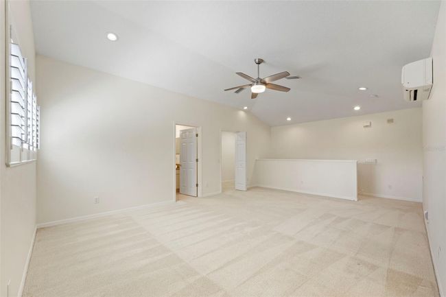 Upstairs bonus room with full bathroom and double walk in storage closet. | Image 40