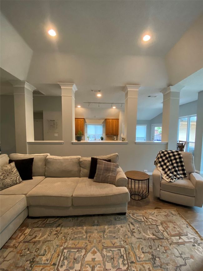 Living room featuring recessed lighting, ornate columns, and wood finished floors | Image 12