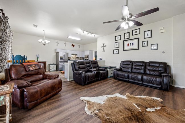 Spacious walls perfect for showcasing artwork, adding a personal touch to the open and inviting living area. | Image 7