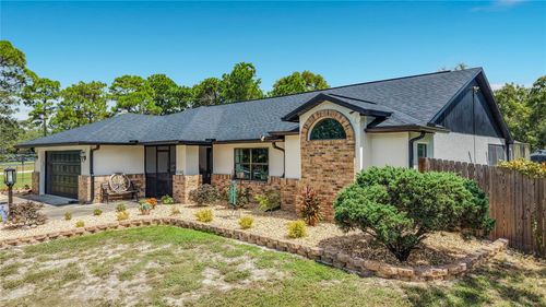 9238 Tree Top Ln, HUDSON, FL, 34669-1902 | Card Image