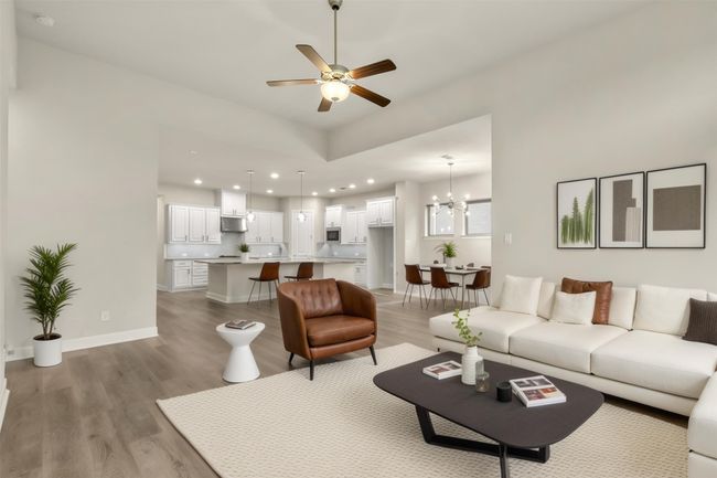 Virtually staged Living area with light wood-type flooring, recessed lighting, a chandelier, ceiling fan, and baseboards | Image 14