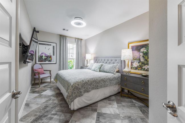 The spacious secondary bedroom easily fits a king-size bed, with ample room to spare. All rooms, including this one, are handicap accessible, ensuring convenience and ease for everyone. | Image 13