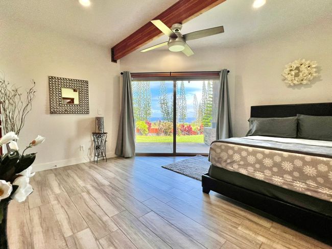 Guest bedroom downstairs opens to nature | Image 17