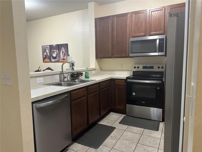 1303 - 10636 Regent Square Dr, Condo with 3 bedrooms, 3 bathrooms and null parking in Orlando FL | Image 14