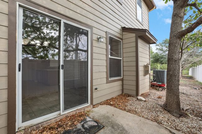 Property entrance featuring a patio and cooling unit | Image 33