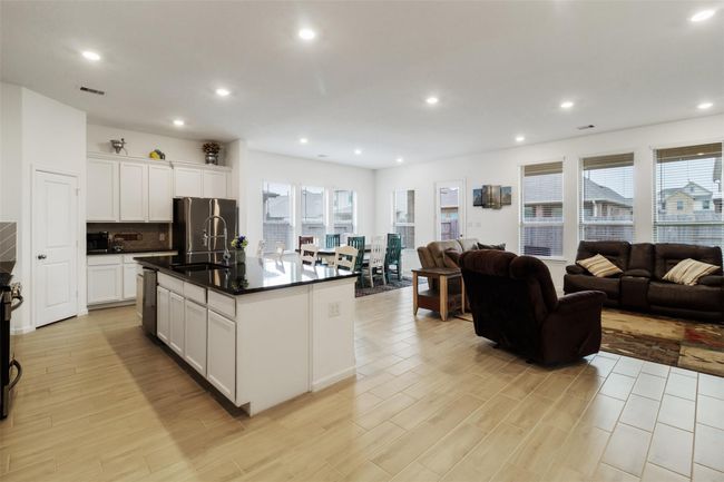 With an Island this size and open to the living room, you could host all of your family gatherings. | Image 15