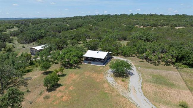 Drone / aerial view featuring a view of trees | Image 39