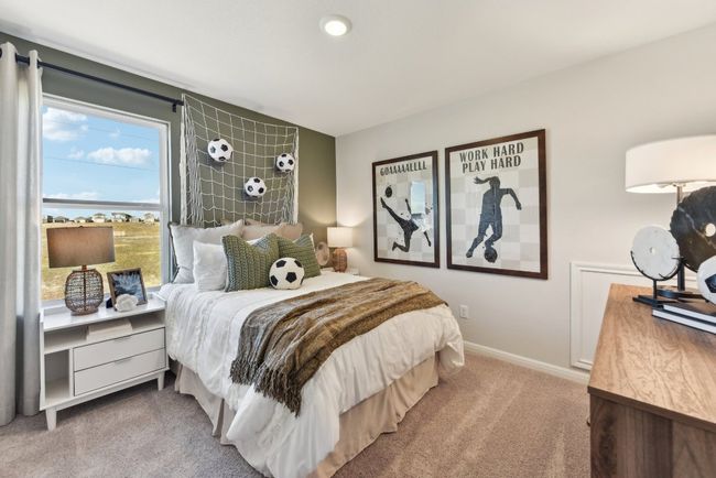 Carpeted bedroom featuring baseboards | Image 13