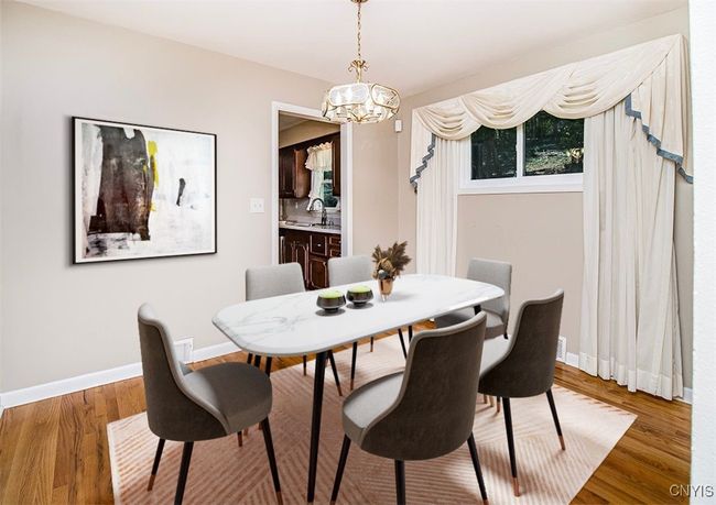 A virtually staged room provides a look into a furnished space... | Image 16