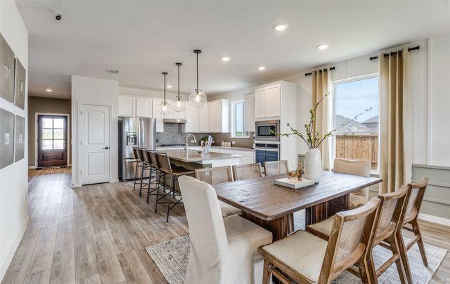 Open kitchen layout perfect for entertaining and creating a connected home environment *Model representation | Image 4