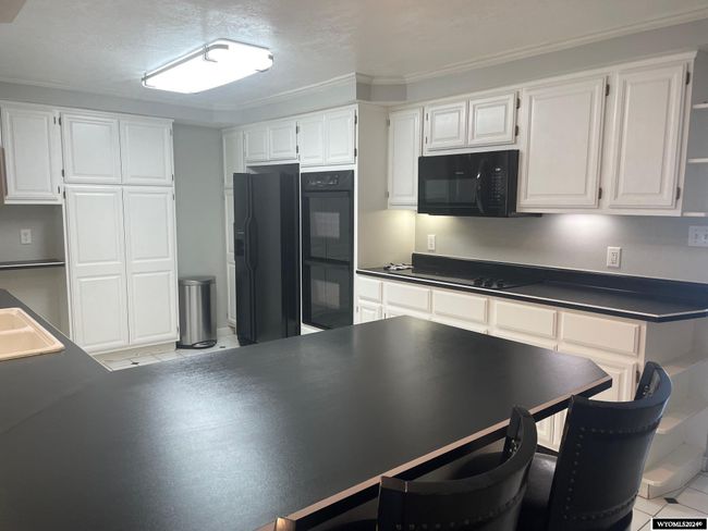 405 Harshman St, House other with 4 bedrooms, 1 bathrooms and null parking in Rawlins WY | Image 9