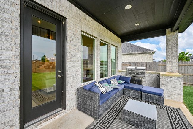 Custom-built kitchen designed for effortless family entertaining, with a seamless flow to the expansive backyard retreat. | Image 16