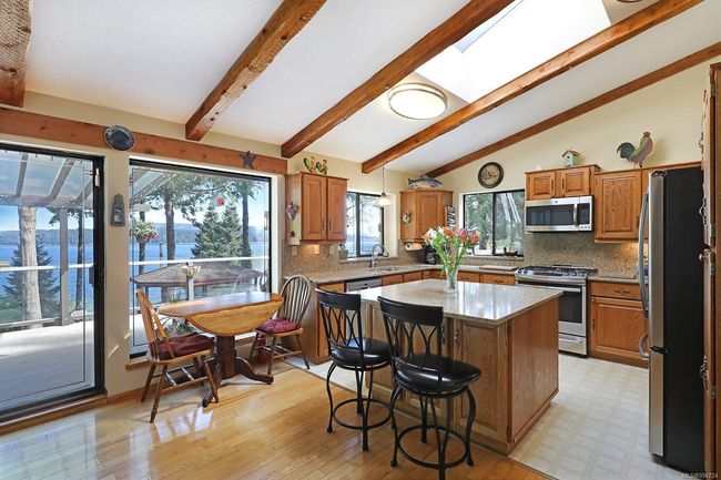 ABUNDANCE OF NATURAL LIGHT THROUGH EXPANSIVE WINDOWS & SKY LIGHTS | Image 17