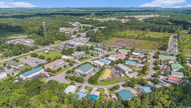 Aerial view of property's location with a forest | Image 40