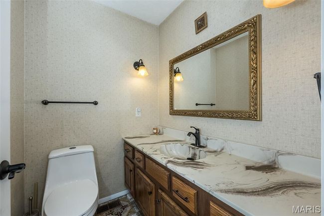 Half bathroom with vanity and toilet | Image 10