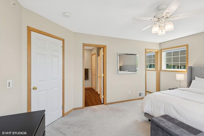 The primary bedroom has a large walk-in closet and is connected to the upper level full bath | Image 28