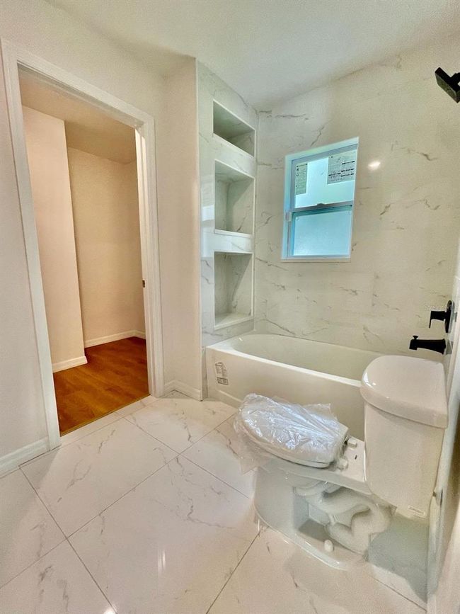 404 St Johns Ln, House other with 4 bedrooms, 2 bathrooms and null parking in POINCIANA FL | Image 13