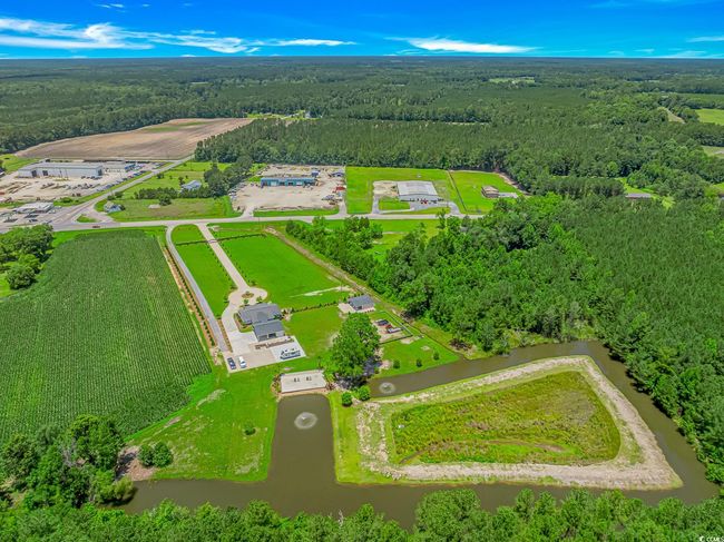 Bird's eye view of a heavily wooded area | Image 32