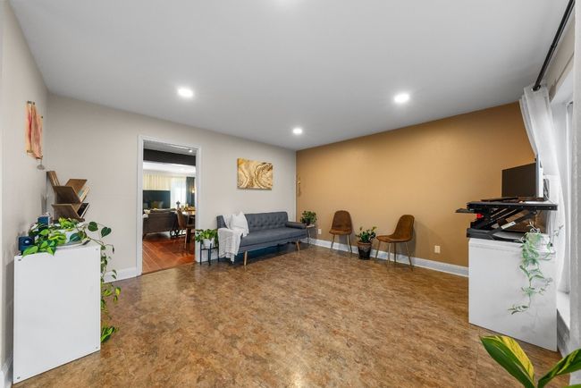 Den featuring an open space for a home office, library or family room | Image 14