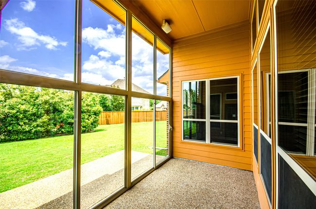 View of unfurnished sunroom | Image 23