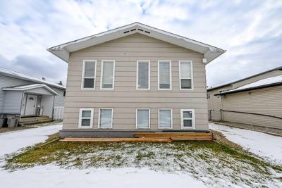 10511 102 Ave, Home with 6 bedrooms, 2 bathrooms and 4 parking in Grande Prairie AB | Image 2