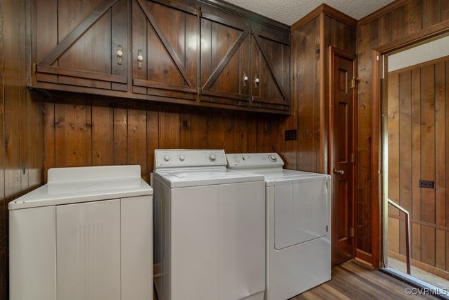 Cabinets & closet; at back door/garage entry | Image 12