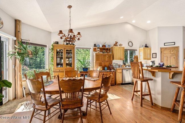 Dining Area looking towards breakfast nook and kitchen | Image 13