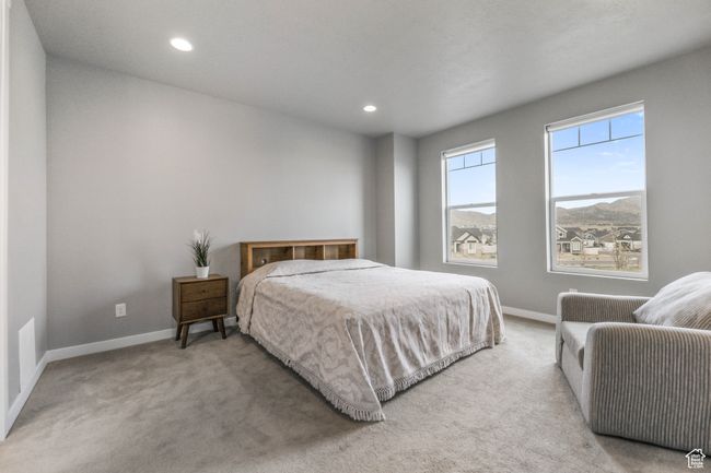 Bedroom featuring recessed lighting, baseboards, and light colored carpet | Image 19