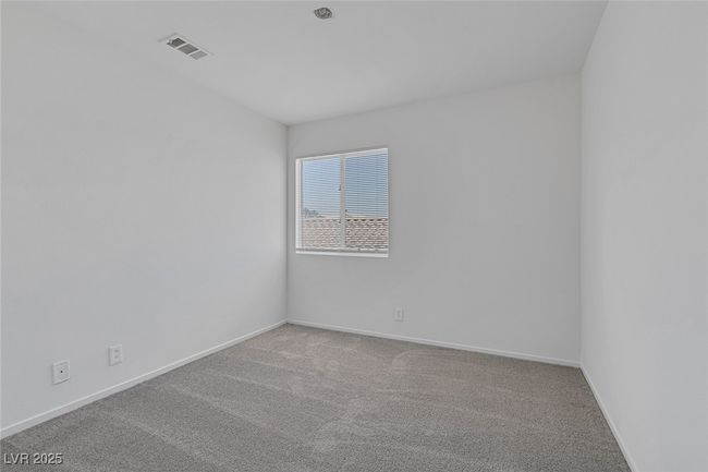 Spare room featuring carpet floors and baseboards | Image 27