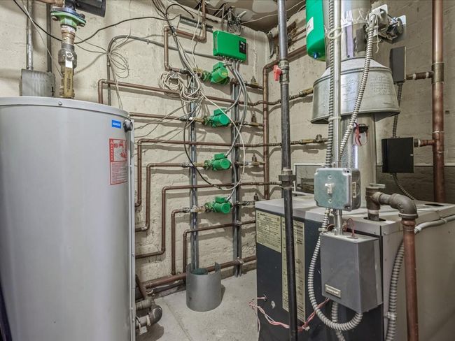 Utility room with water heater | Image 31