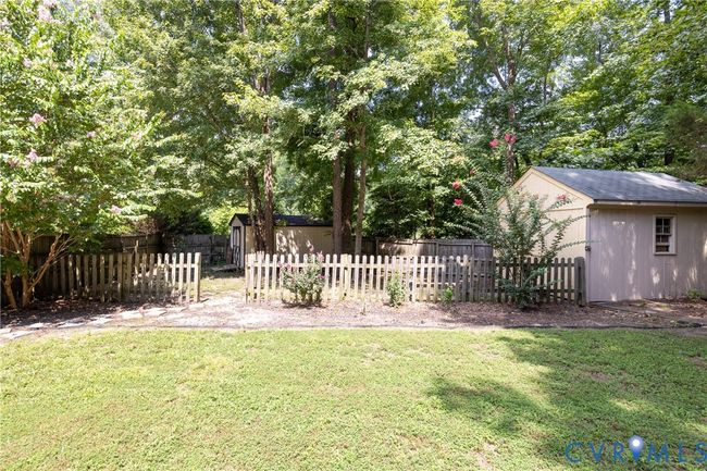 View of yard featuring a storage shed | Image 49