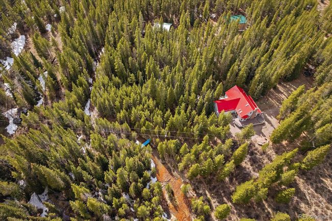 Aerial over home and river | Image 6