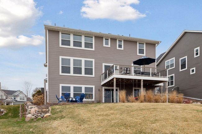 Backyard has been nicely landscaped and features an irrigation system | Image 42
