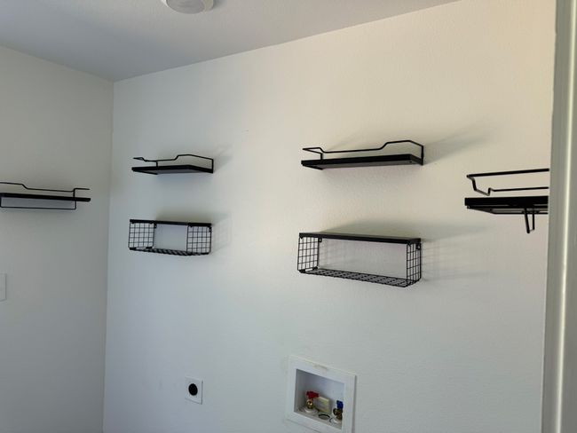 Washroom featuring hookup for a washing machine and hookup for an electric dryer | Image 5