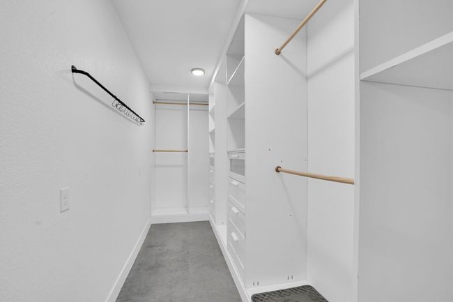 View of spacious closet | Image 32