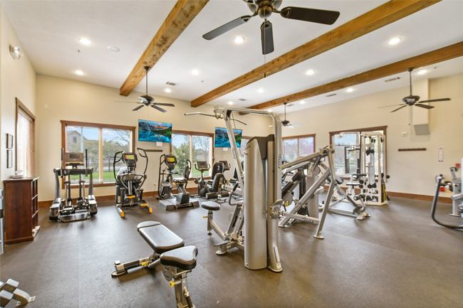 Community Exercise room featuring recessed lighting and beam ceiling | Image 31
