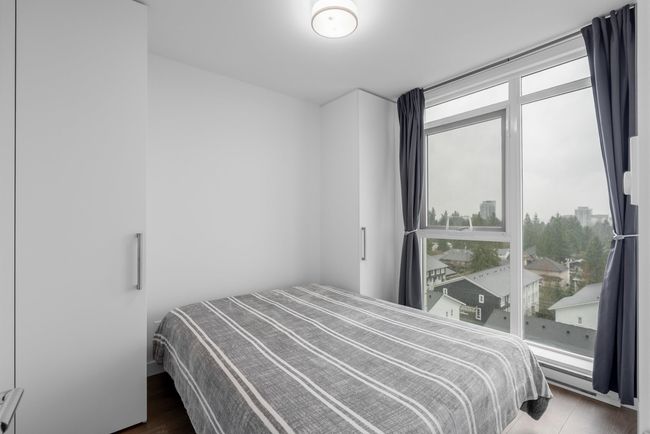 Bedroom featuring wood finished floors | Image 7