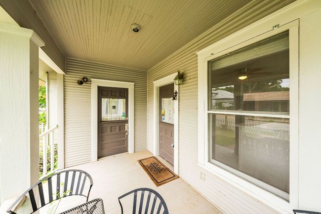 Doorway to property with a porch | Image 22