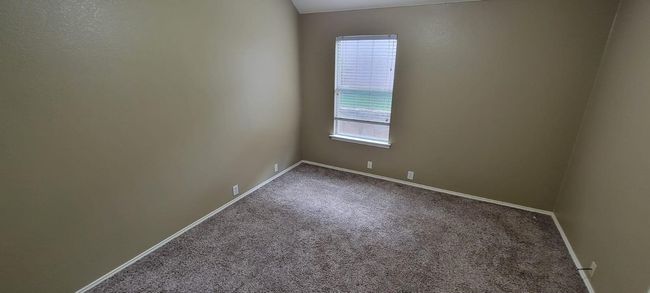 Spare room with carpet and baseboards | Image 11