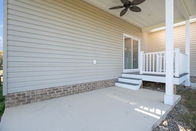 View of patio / terrace with ceiling fan | Image 45