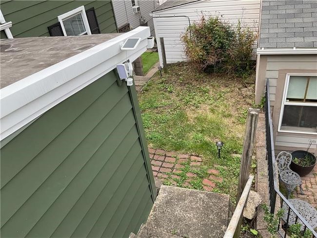 Outside steps down to the back door & yard area | Image 18