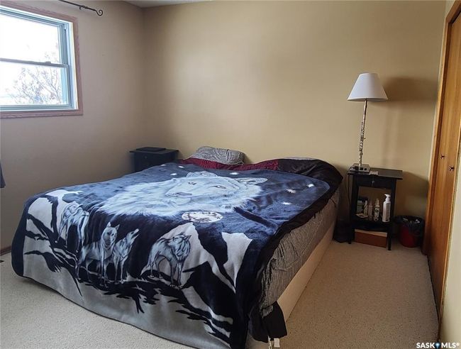 Bedroom with light colored carpet | Image 19