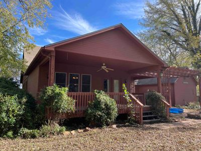 BACK PORCH OF HOME featuring a pergola and ceiling fan | Image 3