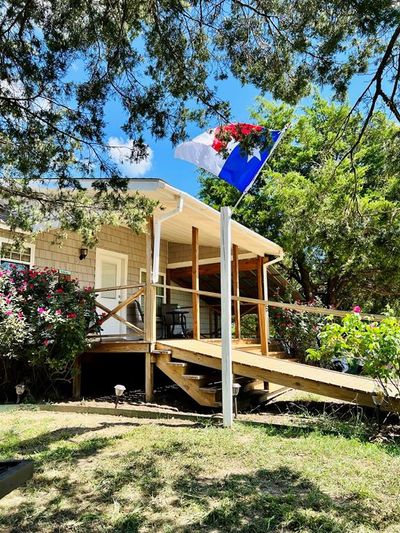 Rear view of property with a lawn | Image 1