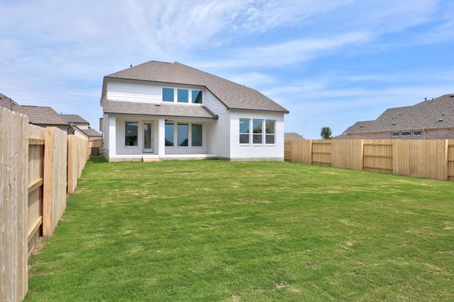 Back of property featuring a shingled roof | Image 27