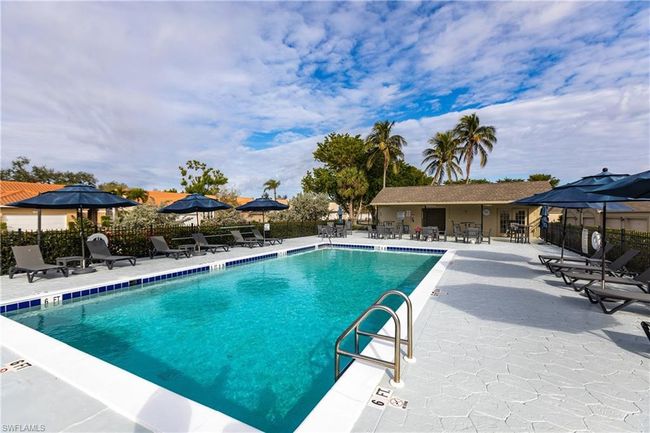 Community pool featuring a patio area | Image 29
