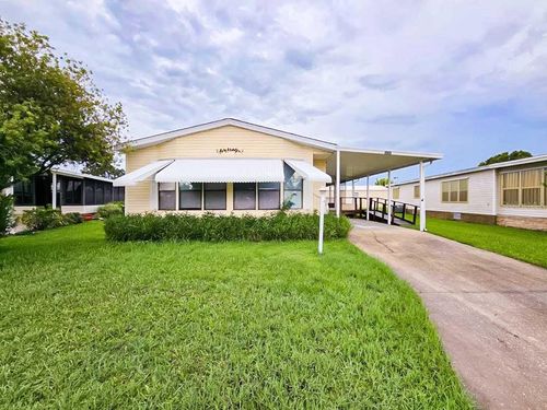 614 Hyacinth Cir, Barefoot Bay, FL, 32976-7667 | Card Image